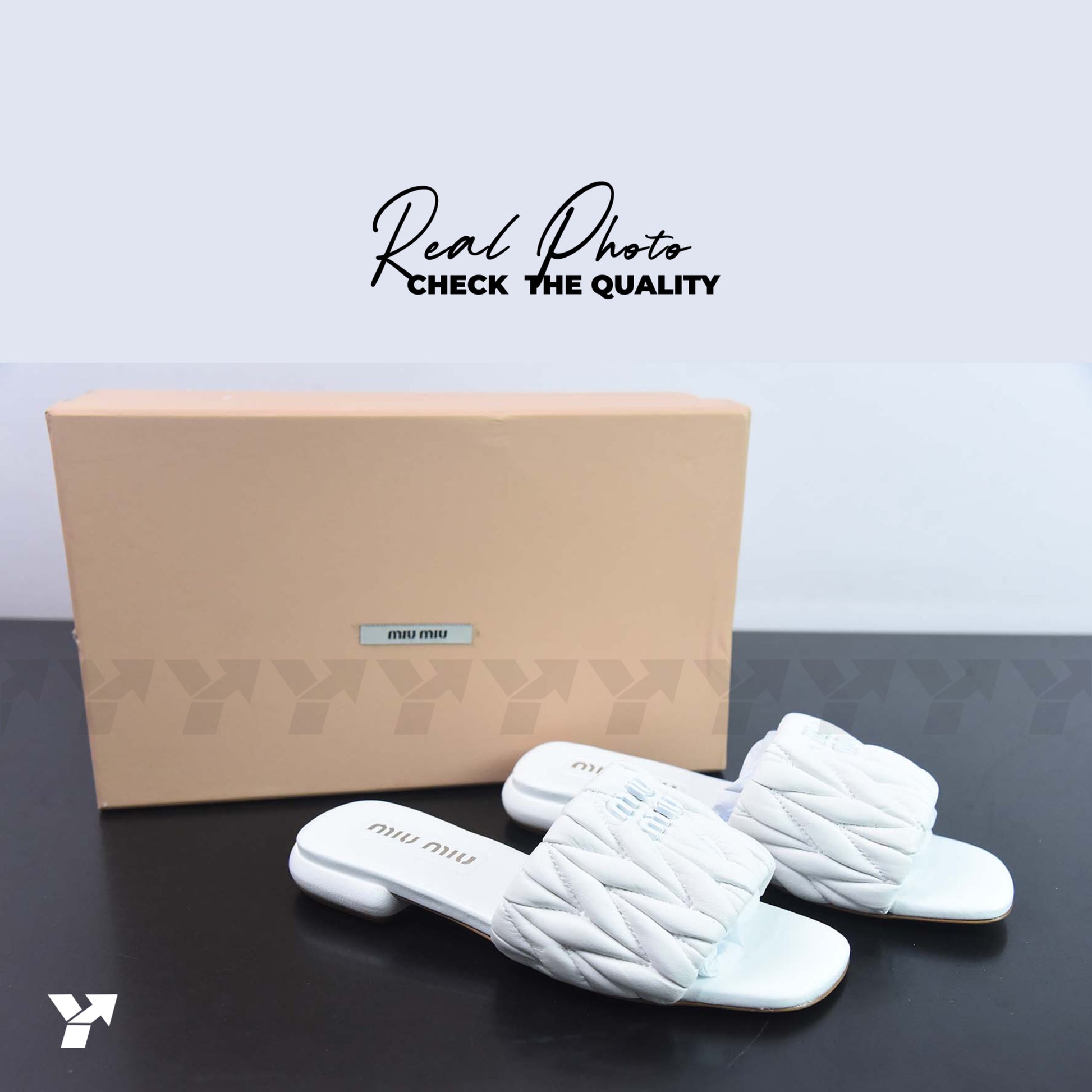 Miu Miu matelassé leather slides-White
