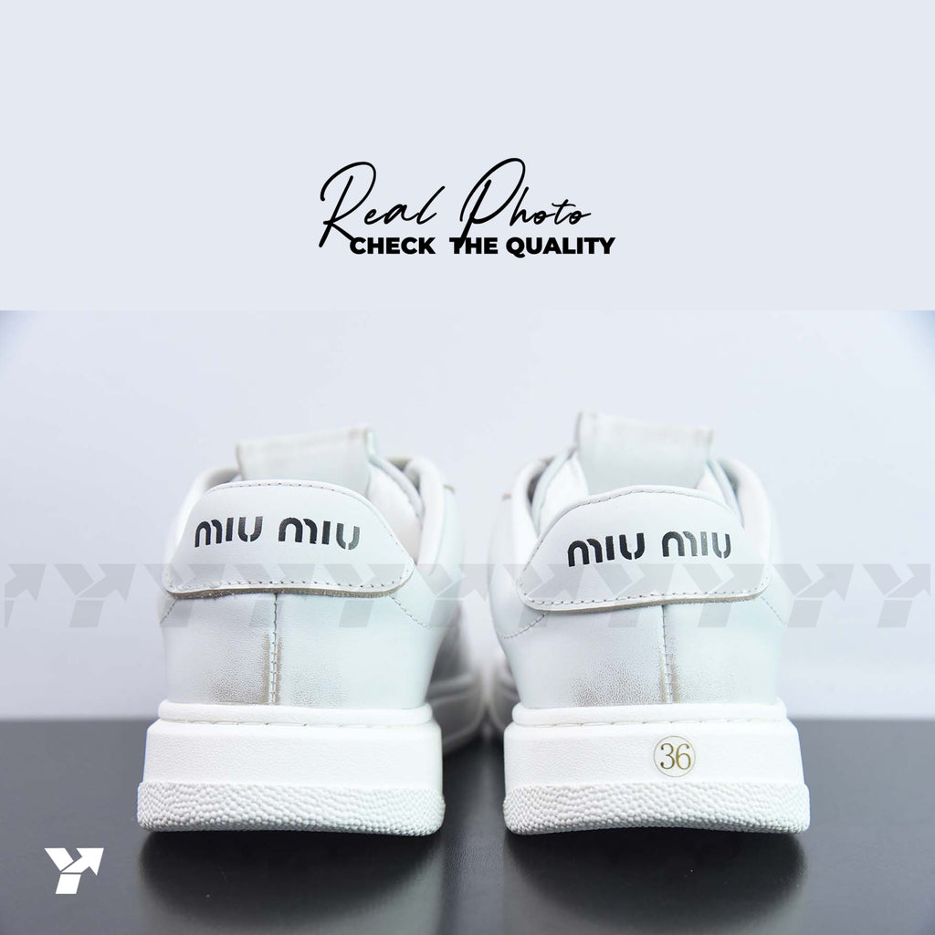 Miu Miu bleached leather sneakers-White