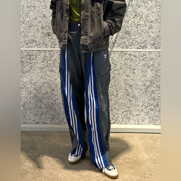 ADIDAS  Originals x KR OP collaboration SS24, featuring a deconstructed clover logo patchwork loose-fitting workwear style with a zipper