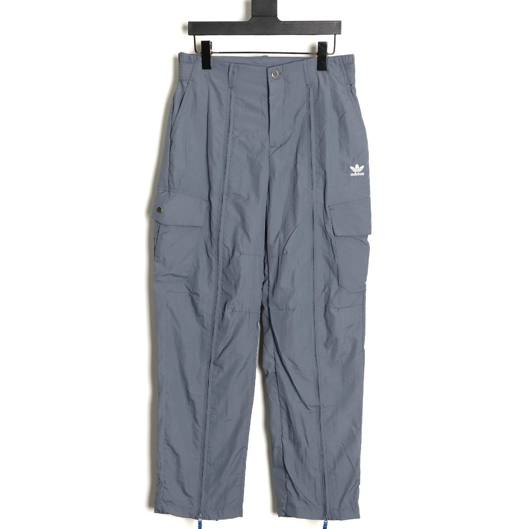 ADIDAS  Originals x KR OP collaboration SS24, featuring a deconstructed clover logo patchwork loose-fitting workwear style with a zipper