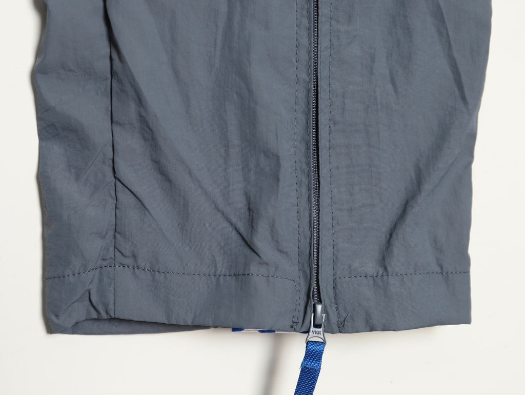 ADIDAS  Originals x KR OP collaboration SS24, featuring a deconstructed clover logo patchwork loose-fitting workwear style with a zipper