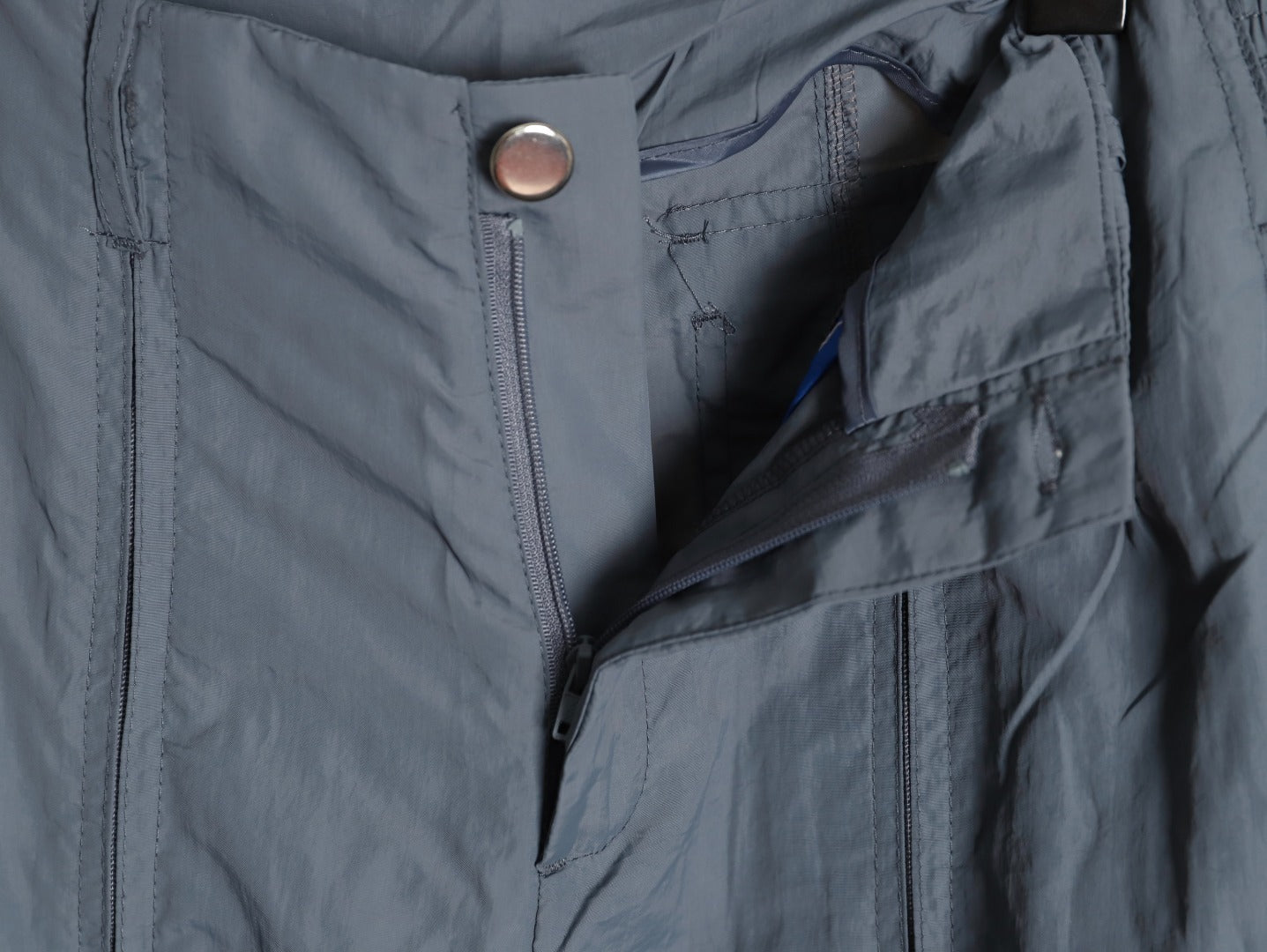 ADIDAS  Originals x KR OP collaboration SS24, featuring a deconstructed clover logo patchwork loose-fitting workwear style with a zipper