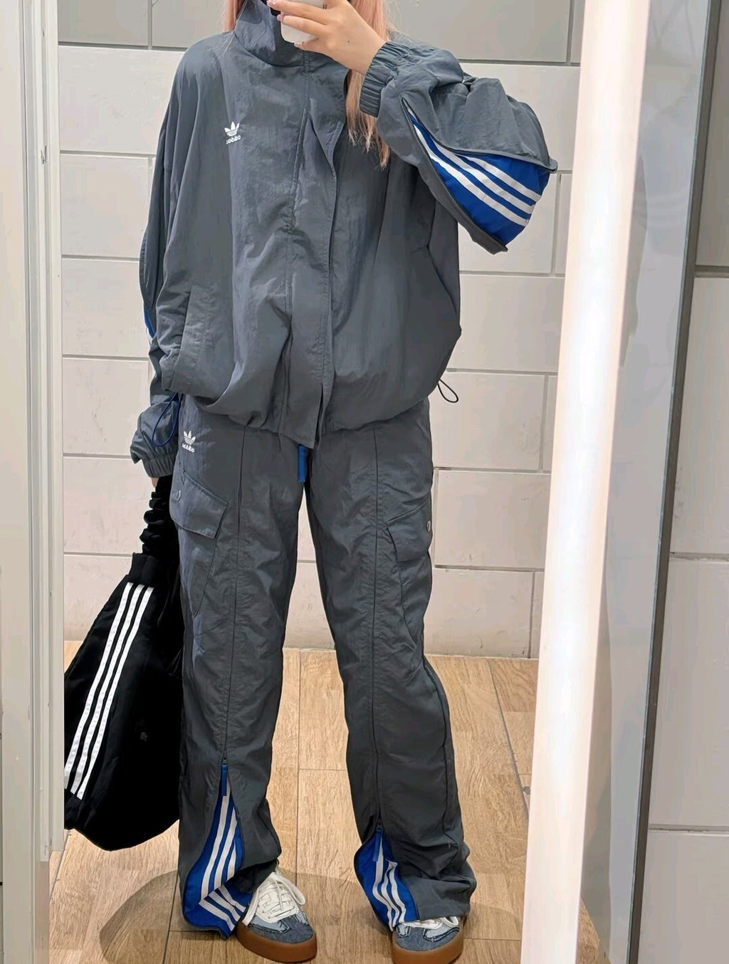 ADIDAS  Originals x KR OP collaboration SS24, featuring a deconstructed clover logo patchwork loose-fitting workwear style with a zipper