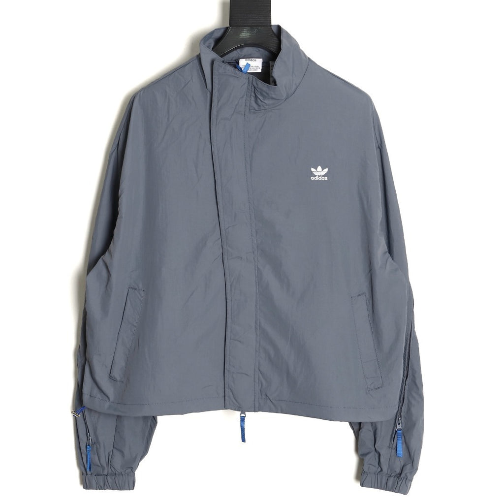 ADIDAS  Originals x KR OP collaboration SS24, featuring a deconstructed clover logo patchwork loose-fitting workwear style with a zipper
