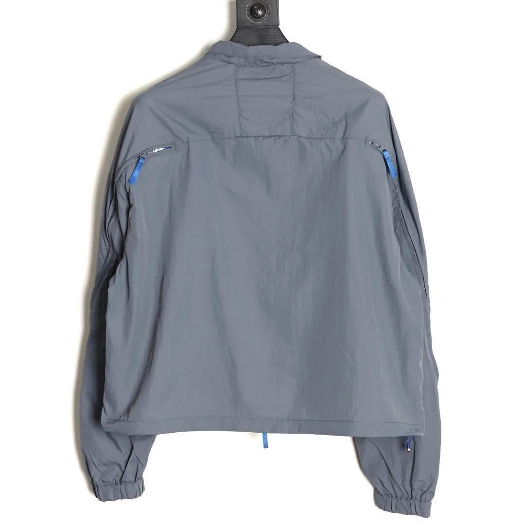 ADIDAS  Originals x KR OP collaboration SS24, featuring a deconstructed clover logo patchwork loose-fitting workwear style with a zipper