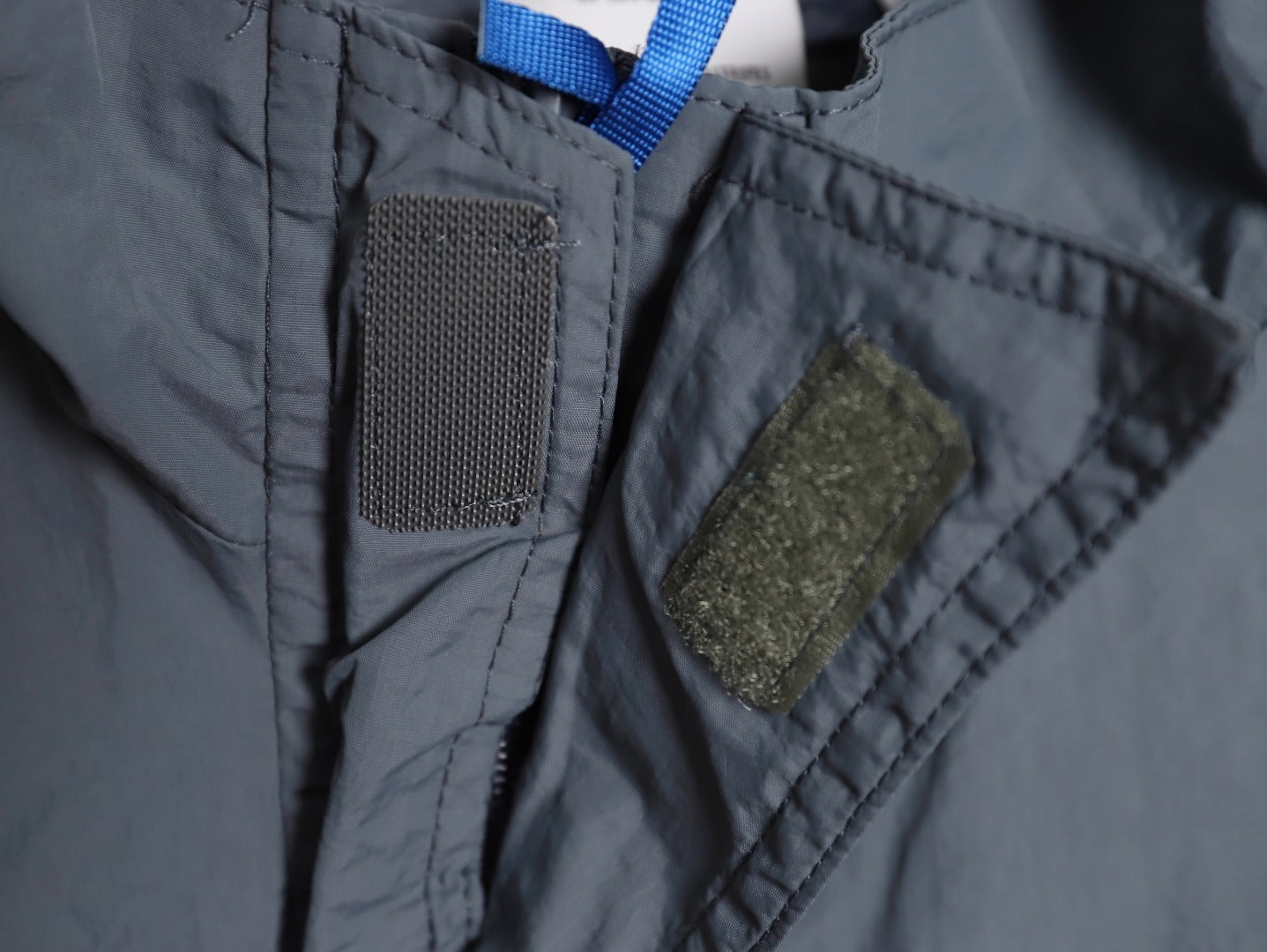 ADIDAS  Originals x KR OP collaboration SS24, featuring a deconstructed clover logo patchwork loose-fitting workwear style with a zipper