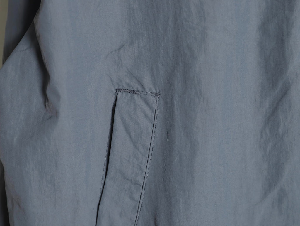 ADIDAS  Originals x KR OP collaboration SS24, featuring a deconstructed clover logo patchwork loose-fitting workwear style with a zipper