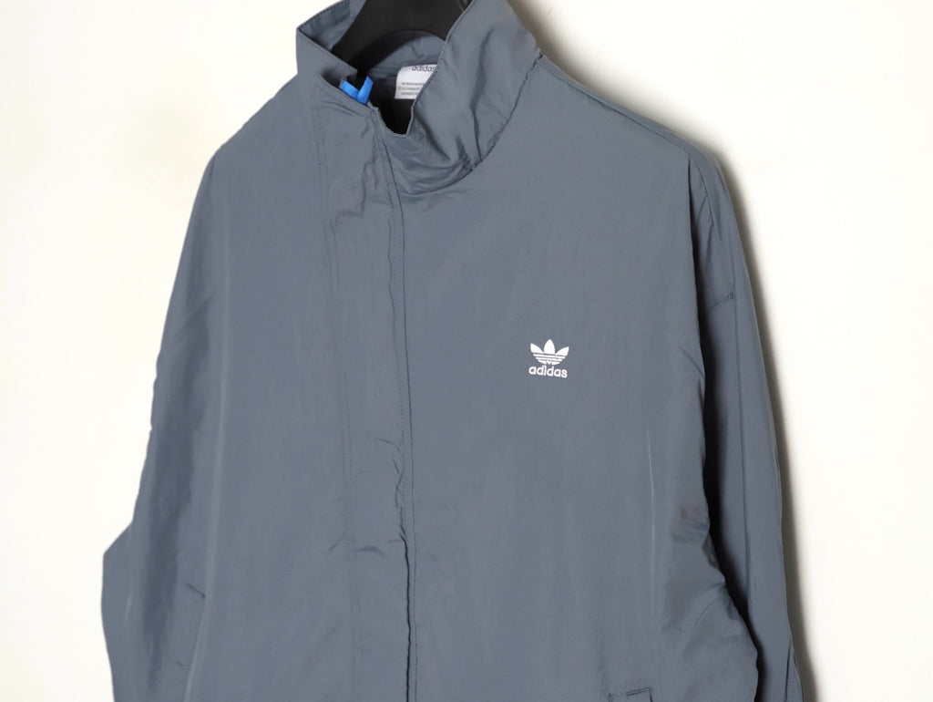 ADIDAS  Originals x KR OP collaboration SS24, featuring a deconstructed clover logo patchwork loose-fitting workwear style with a zipper