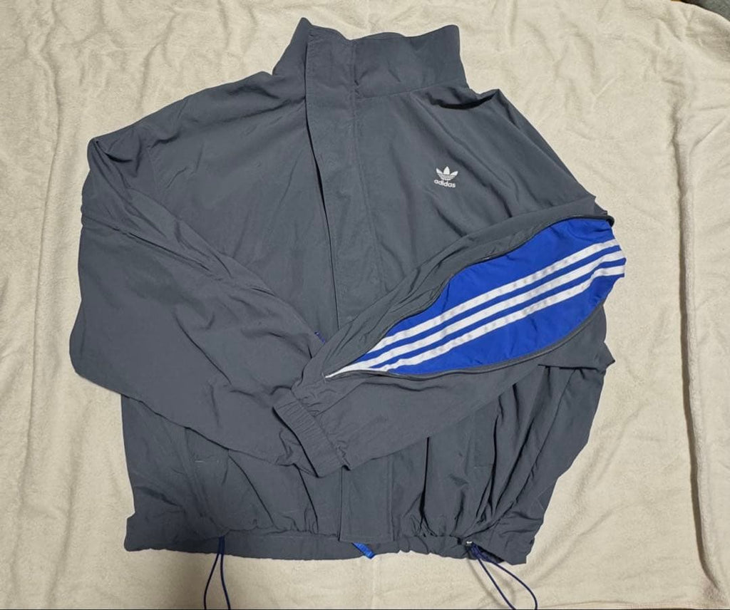 ADIDAS  Originals x KR OP collaboration SS24, featuring a deconstructed clover logo patchwork loose-fitting workwear style with a zipper