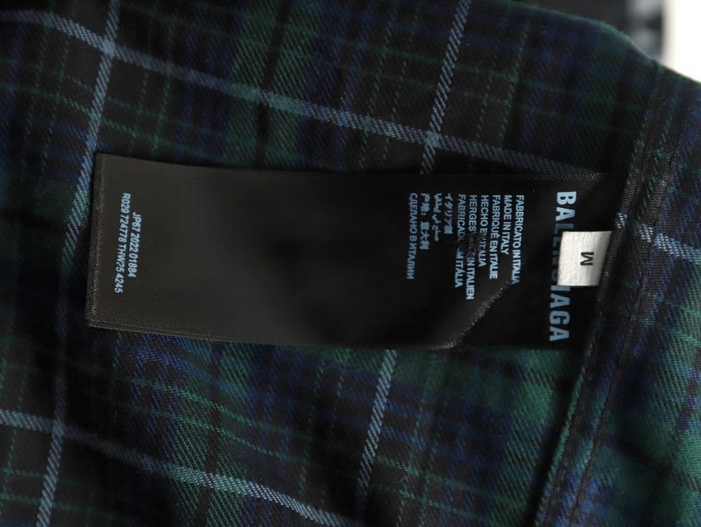Balenciaga long-sleeved shirt with blurred lettering and plaid pattern