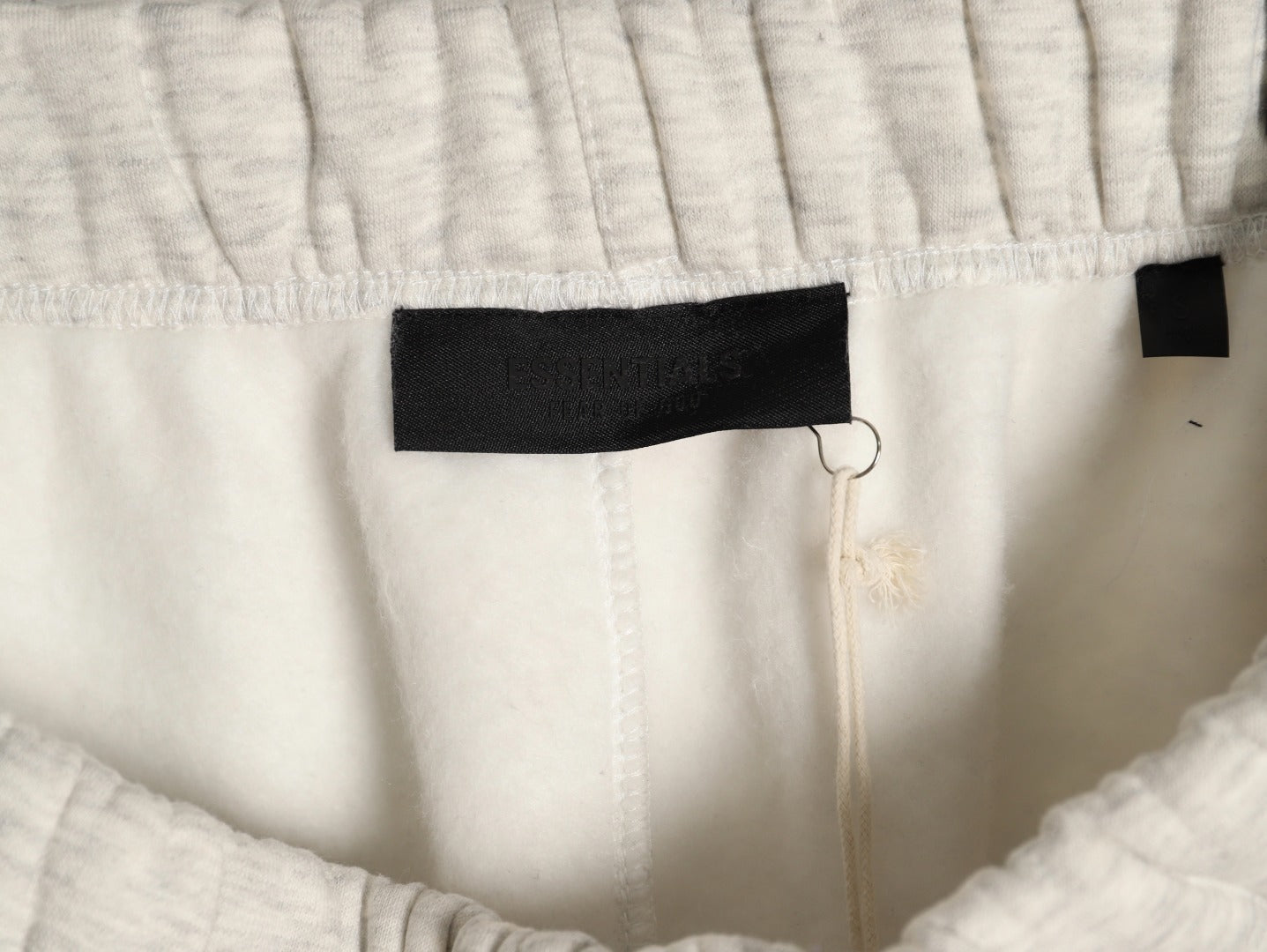 Essential Fear Of God Men’s collaboration with NBA Relaxed Sweatpants