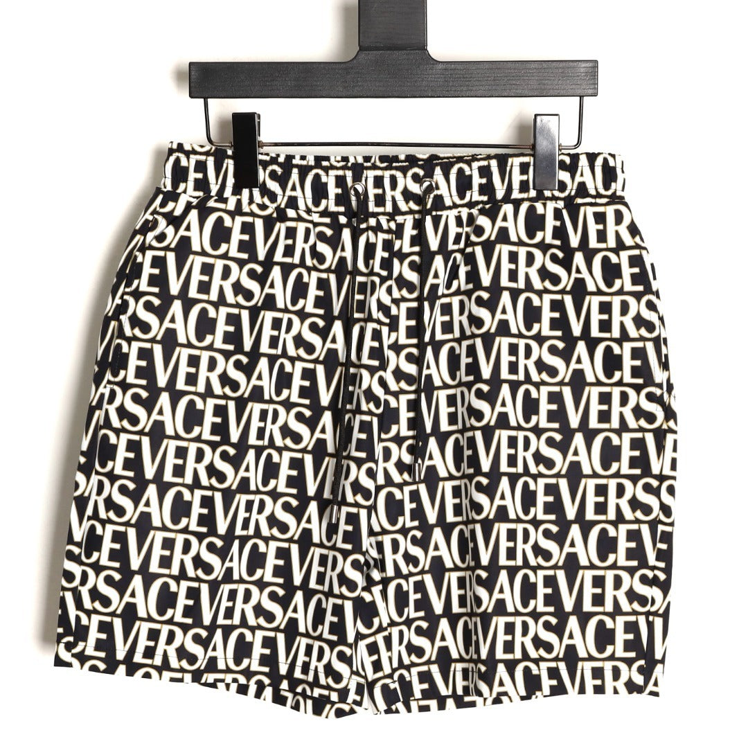Versace all-over print beach shorts