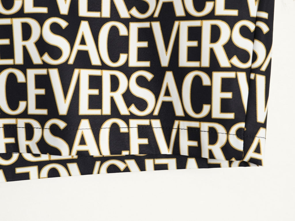 Versace all-over print beach shorts