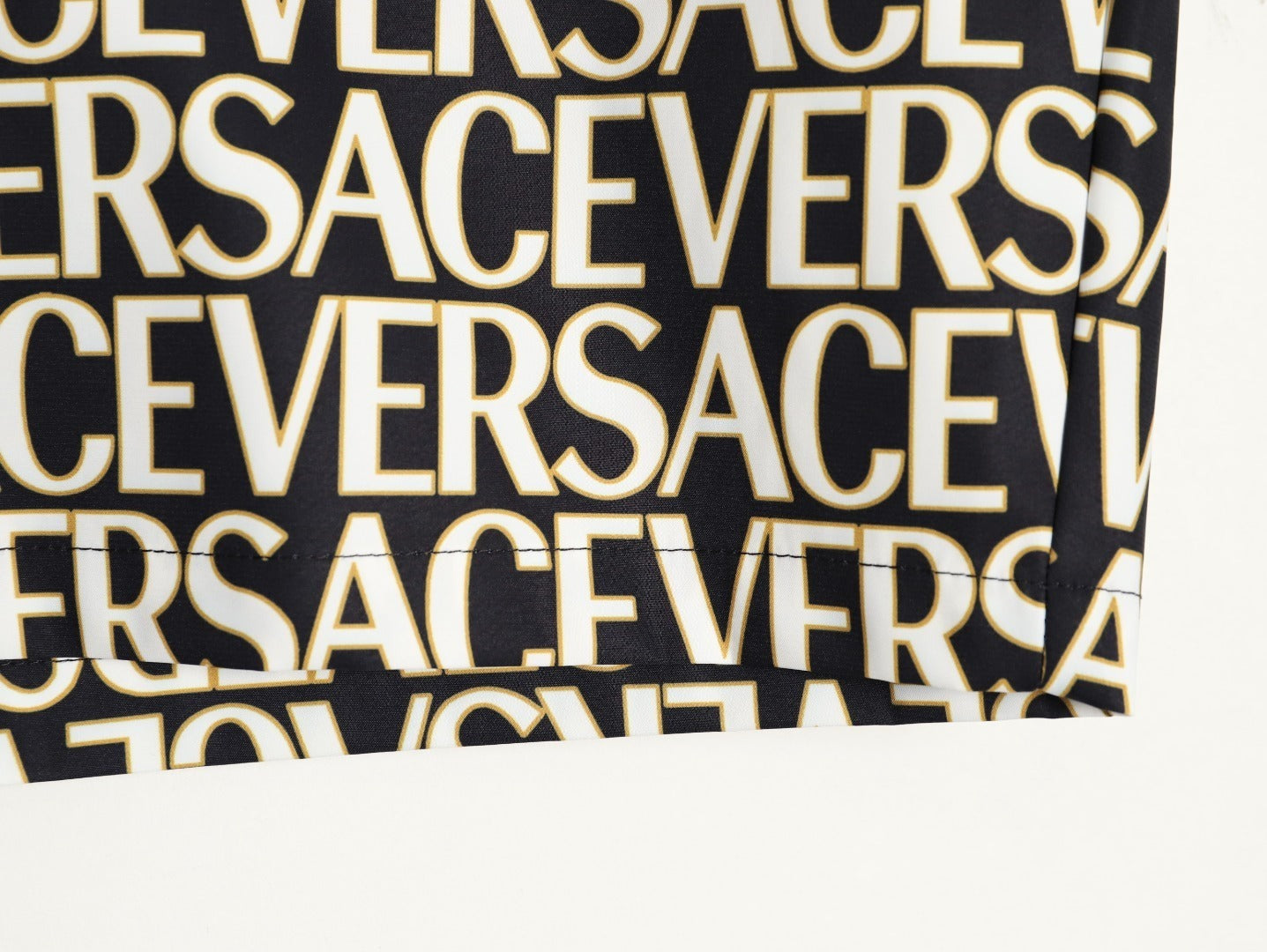 Versace all-over print beach shorts