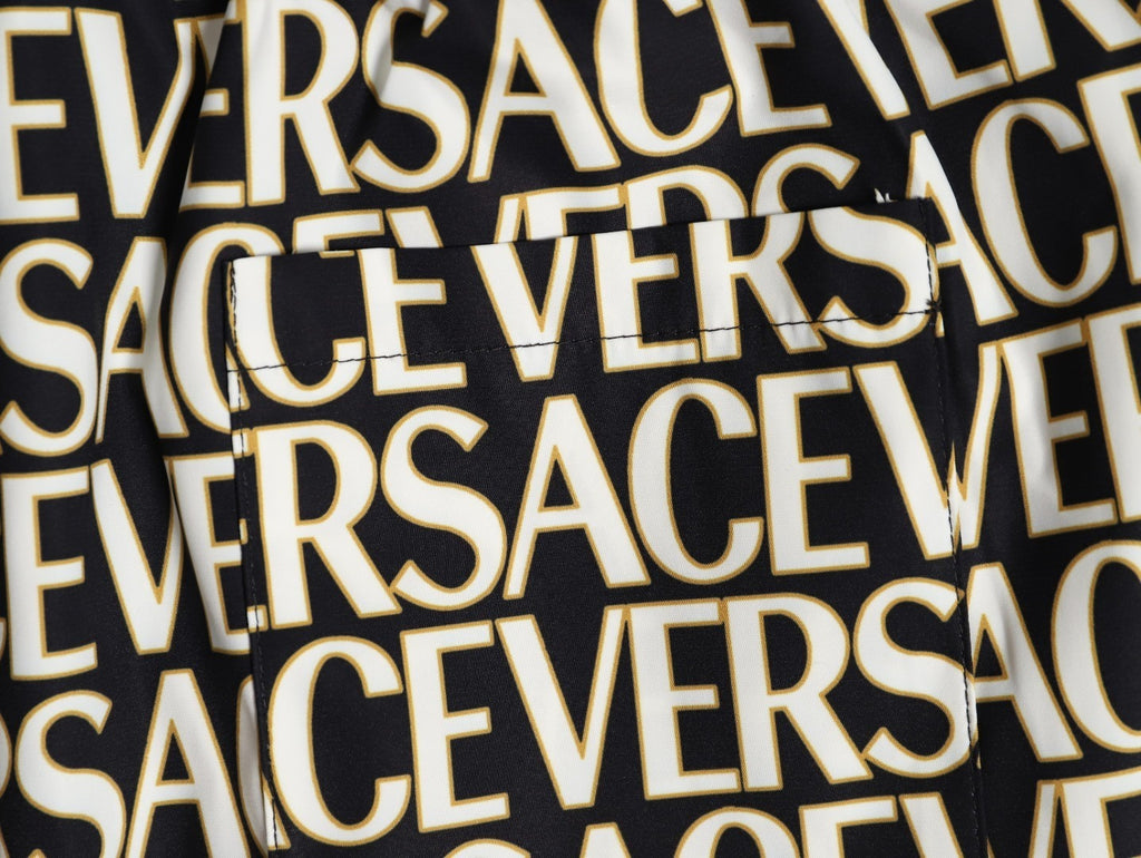 Versace all-over print beach shorts