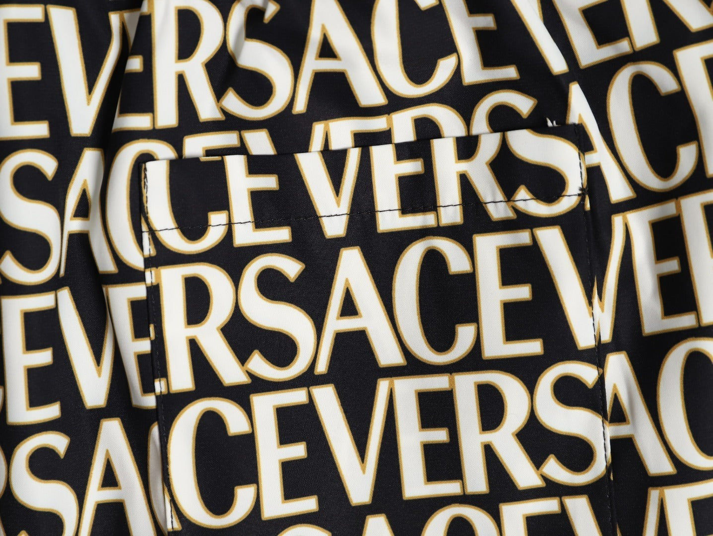 Versace all-over print beach shorts