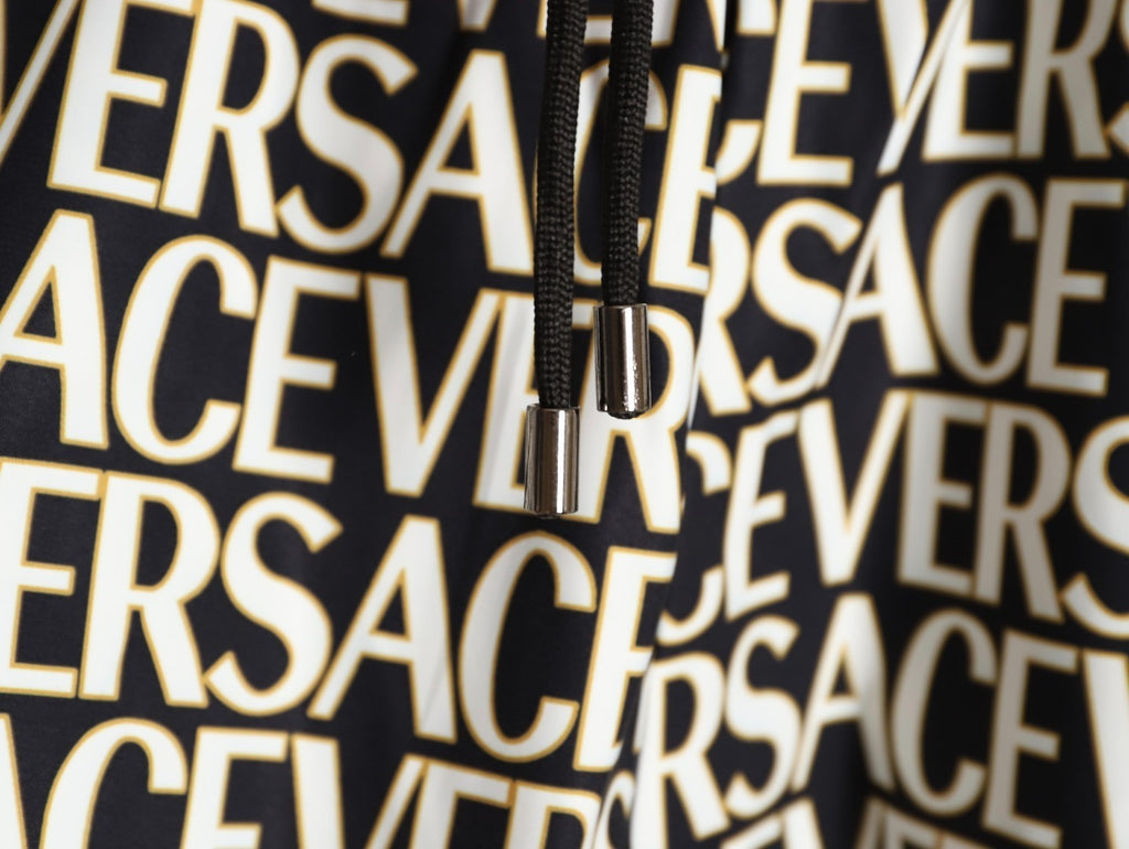 Versace all-over print beach shorts