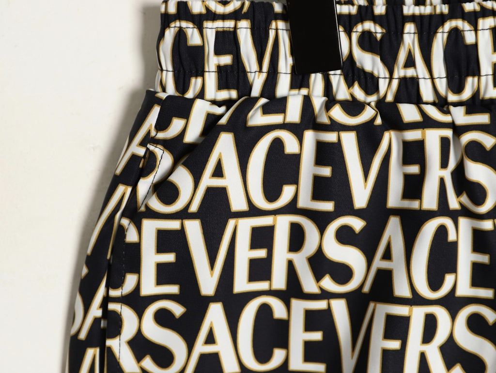 Versace all-over print beach shorts