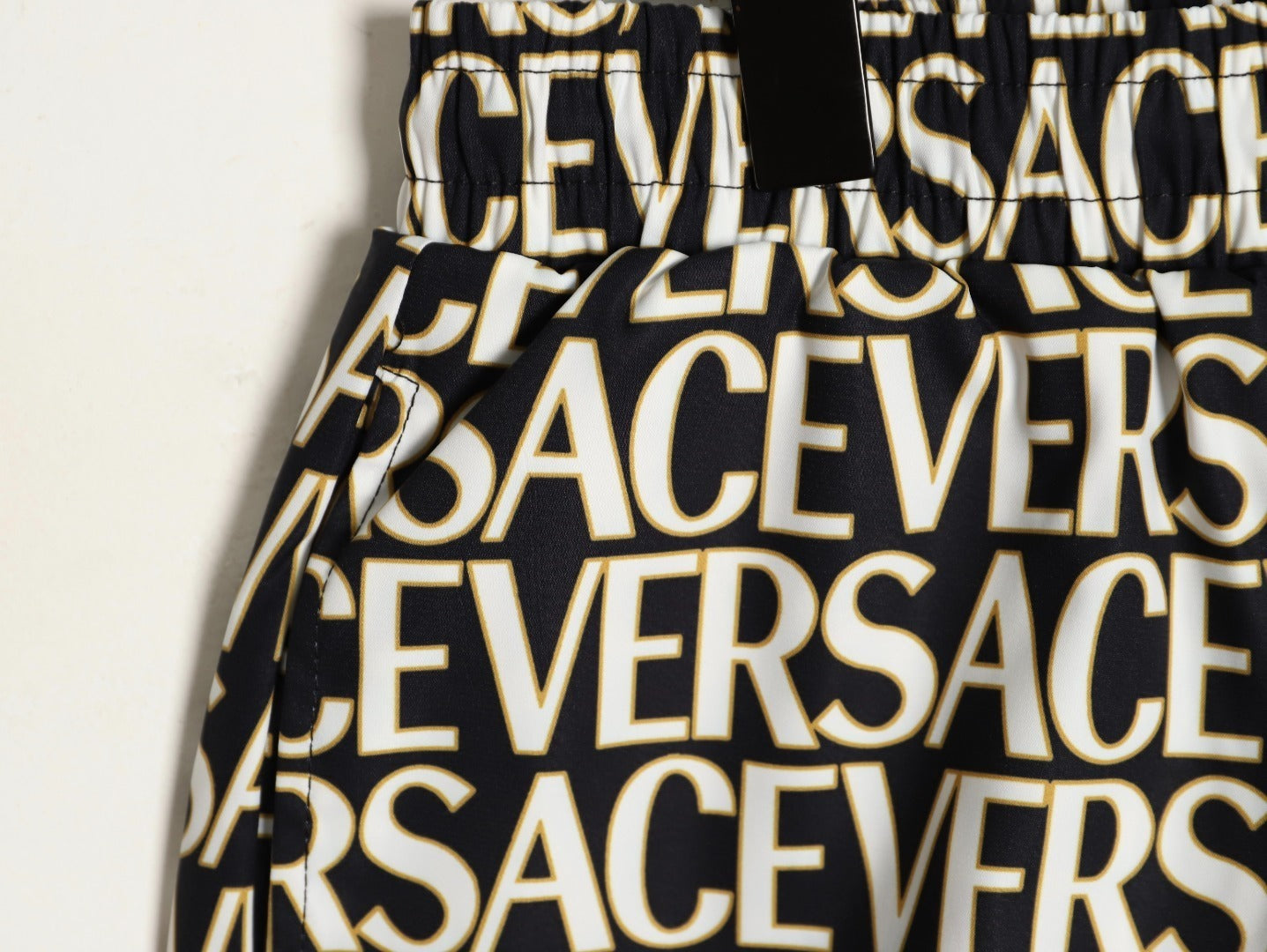 Versace all-over print beach shorts