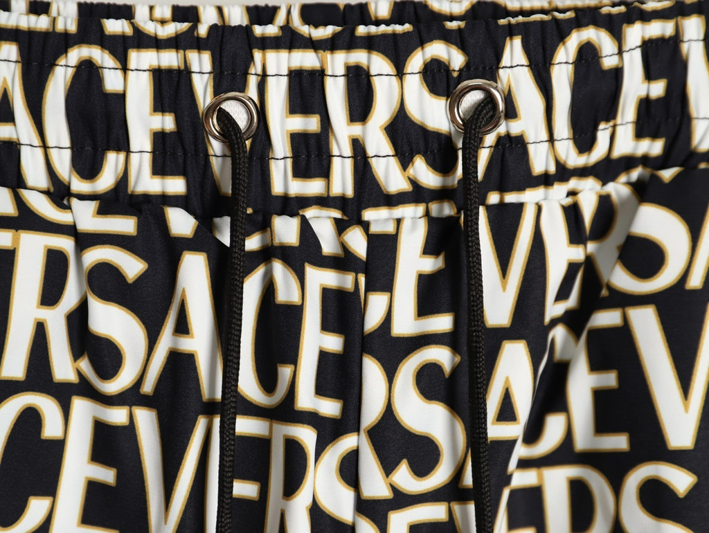 Versace all-over print beach shorts