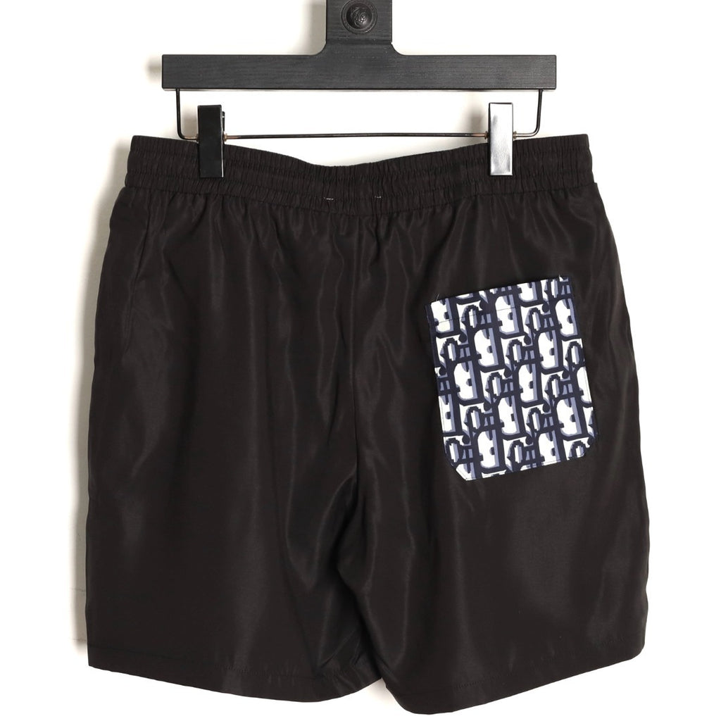 Dior embroidered letter back pocket beach shorts