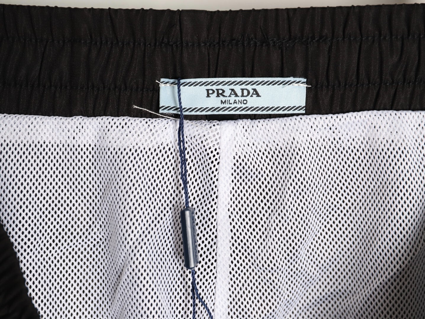 Prada classic red striped triangle logo beach shorts