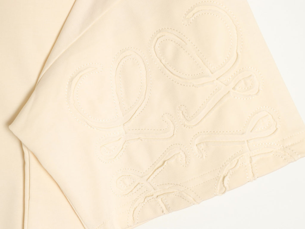 Loewe sleeved T-shirt with logo patchwork embroidery on the cuffs