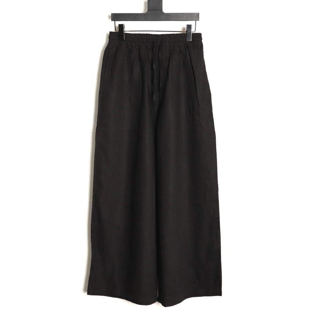 LOEWE Anagram embroidered linen trousers