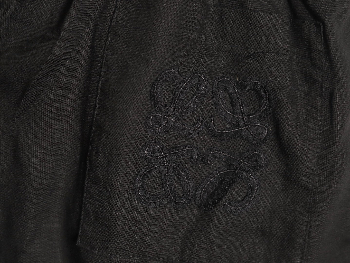 LOEWE Anagram embroidered linen trousers
