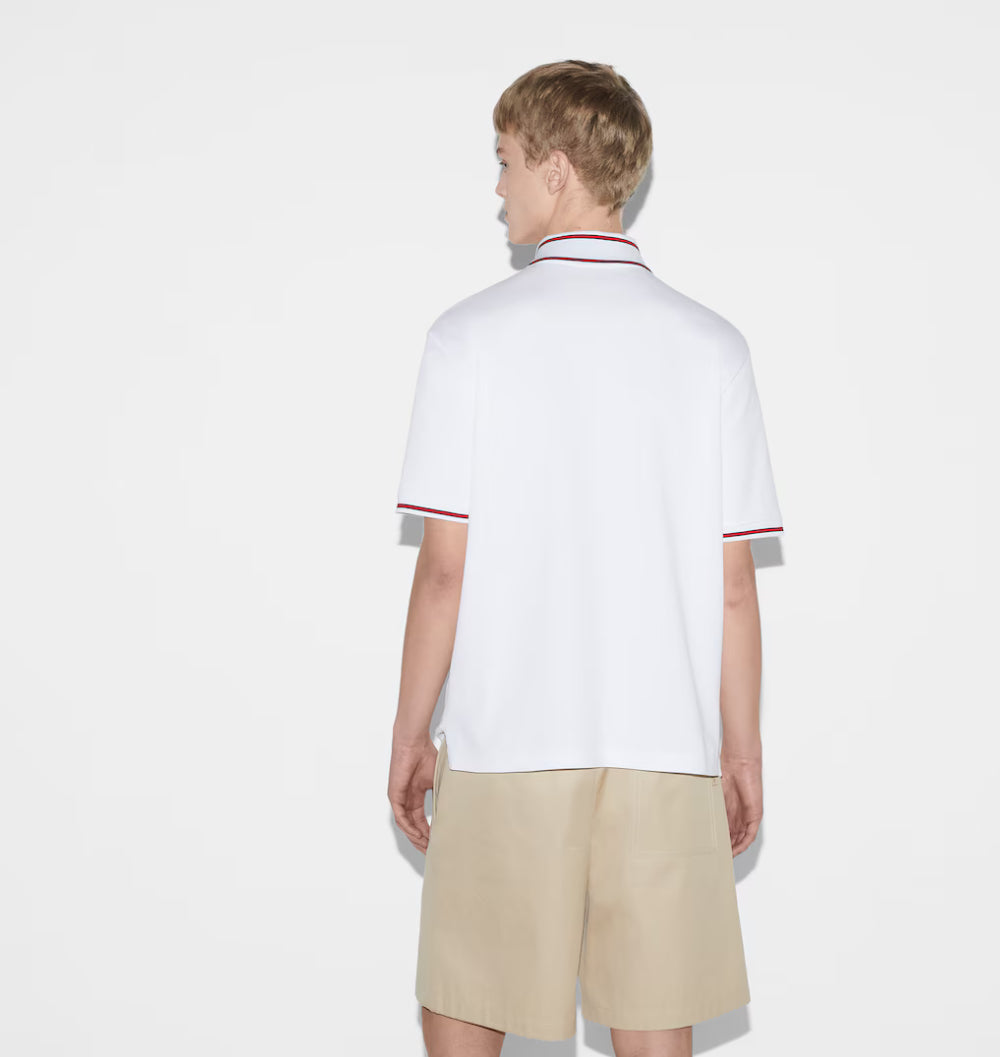 GUCCI short-sleeved polo shirt with lettering and woven ribbon at the neckline.