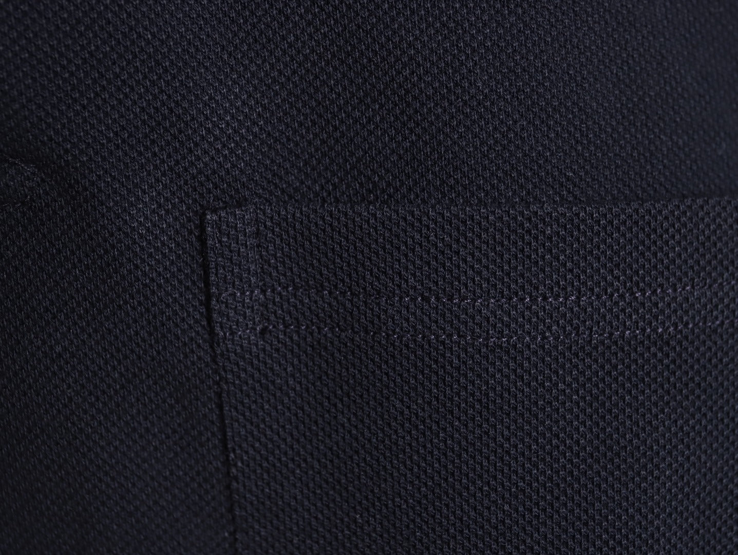 GUCCI short-sleeved polo shirt with lettering and woven ribbon at the neckline.