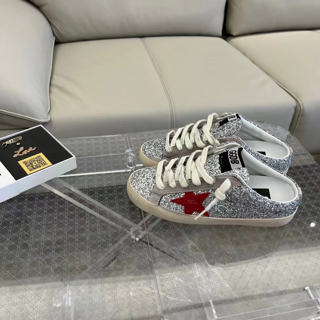 Golden Goose Super-Star Sabots in silver glitter with red leather star
